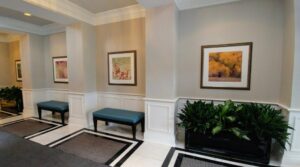 Custom Framed artwork installed in a corporate spaces hallway