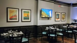 Custom Framed Chicago vintage artwork installed in a restaurant in Evanston